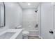 Clean bathroom featuring a modern vanity, a large mirror, and a shower-tub combination at 2169 Wingfoot Pl, Decatur, GA 30035