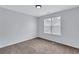Bedroom with neutral carpet, large window and lots of natural light at 2169 Wingfoot Pl, Decatur, GA 30035