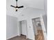 Bright bedroom featuring neutral walls, plush carpet, and a vaulted ceiling with a ceiling fan at 2169 Wingfoot Pl, Decatur, GA 30035