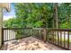 Enjoy the wood deck that overlooks a yard with mature trees and privacy at 2169 Wingfoot Pl, Decatur, GA 30035