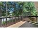 View from the deck overlooking the road with abundant forestry in the background at 2169 Wingfoot Pl, Decatur, GA 30035
