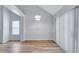 Dining room with luxury vinyl plank flooring and a stylish hanging light fixture at 2169 Wingfoot Pl, Decatur, GA 30035