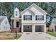 Inviting two-story home features a two-car garage, and charming front entry at 2169 Wingfoot Pl, Decatur, GA 30035
