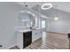 Bright kitchen featuring a counter and sink overlooking an open living area at 2169 Wingfoot Pl, Decatur, GA 30035