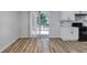 Kitchen and dining area with wood floors and access to the patio at 2169 Wingfoot Pl, Decatur, GA 30035