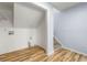 Spacious laundry room with a closet, wood-look flooring, and utility connections at 2169 Wingfoot Pl, Decatur, GA 30035