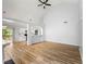 Spacious living room with hardwood floors, vaulted ceilings and a view to the kitchen at 2169 Wingfoot Pl, Decatur, GA 30035