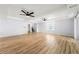 Large living room featuring hardwood floors, modern ceiling fans and lots of open space at 2169 Wingfoot Pl, Decatur, GA 30035