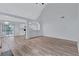 Bright living room with vaulted ceilings and modern wood floors at 2169 Wingfoot Pl, Decatur, GA 30035