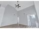 Bright living room with vaulted ceilings and ceiling fan at 2169 Wingfoot Pl, Decatur, GA 30035