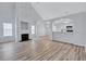 Bright living room featuring a fireplace and open access to the modern kitchen at 2169 Wingfoot Pl, Decatur, GA 30035