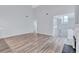 Open living room with light wood floors and neutral paint at 2169 Wingfoot Pl, Decatur, GA 30035