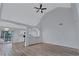 Bright living room with vaulted ceilings and modern wood floors at 2169 Wingfoot Pl, Decatur, GA 30035