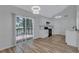 Bright living room features hardwood floors, white cabinets, and an open view to the outside deck at 2169 Wingfoot Pl, Decatur, GA 30035
