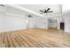 Spacious living room with hardwood floors and modern ceiling fans adds elegant appeal at 2169 Wingfoot Pl, Decatur, GA 30035