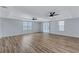 Spacious living room featuring recessed ceiling, wood floors, and lots of natural light at 2169 Wingfoot Pl, Decatur, GA 30035