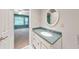 Bathroom with green granite vanity and views into the bedroom at 405 W Leslie Ct, Woodstock, GA 30188