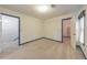 Bedroom with neutral carpet and blue painted trim at 405 W Leslie Ct, Woodstock, GA 30188