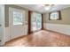 Charming dining room featuring natural light from several windows and direct access to the outside at 405 W Leslie Ct, Woodstock, GA 30188
