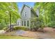 Two-story house with gray siding and a well-maintained yard at 405 W Leslie Ct, Woodstock, GA 30188