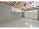 Bright garage with finished floor and insulated ceiling at 405 W Leslie Ct, Woodstock, GA 30188