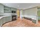 Spacious kitchen offers built-in bench seating and updated appliances, perfect for entertaining at 405 W Leslie Ct, Woodstock, GA 30188