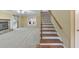 Bright living room with fireplace and staircase at 405 W Leslie Ct, Woodstock, GA 30188
