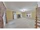Spacious living room features a fireplace and an open layout, perfect for entertaining at 405 W Leslie Ct, Woodstock, GA 30188