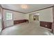 Open living area leads to the entry and other living spaces at 405 W Leslie Ct, Woodstock, GA 30188