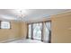 Light-filled living room with large windows, decorative drapes, and crown molding at 405 W Leslie Ct, Woodstock, GA 30188