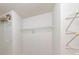 Bright walk-in closet with wire shelving for optimal storage and organization at 405 W Leslie Ct, Woodstock, GA 30188