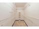 Spacious walk-in closet features ample shelving at 405 W Leslie Ct, Woodstock, GA 30188