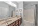 Bright bathroom with double sinks, a bathtub, and neutral-toned decor at 456 Rockford Sw Pass, Marietta, GA 30064
