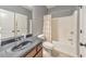 Full bathroom with single sink vanity, bathtub, and tile floors at 456 Rockford Sw Pass, Marietta, GA 30064
