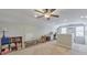 Spacious bonus room with versatile potential, featuring a desk area and ample natural light at 456 Rockford Sw Pass, Marietta, GA 30064