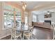 Bright breakfast nook with big windows providing natural light and view of living room at 456 Rockford Sw Pass, Marietta, GA 30064