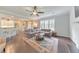 Spacious living room with hardwood floors, stylish rug and open floorplan at 456 Rockford Sw Pass, Marietta, GA 30064