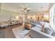 Comfortable living room open to kitchen area features stylish decor and hardwood floors at 456 Rockford Sw Pass, Marietta, GA 30064