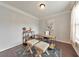 Bright home office with a desk, rug, and natural light from the window, perfect for productivity at 456 Rockford Sw Pass, Marietta, GA 30064