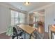 Inviting office space with a desk, chair, and view into the dining area; ideal for working from home at 456 Rockford Sw Pass, Marietta, GA 30064
