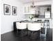 Dining area with stylish chairs, glass table and a partial view of the modern kitchen at 2870 Pharr Court South Nw # 2507, Atlanta, GA 30305