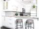 Kitchen with granite countertops, stainless steel appliances and modern breakfast bar at 2870 Pharr Court South Nw # 2507, Atlanta, GA 30305