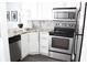 Corner kitchen showcasing stainless steel appliances and granite countertops at 2870 Pharr Court South Nw # 2507, Atlanta, GA 30305