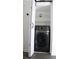 Laundry closet with a modern black washing machine at 2870 Pharr Court South Nw # 2507, Atlanta, GA 30305