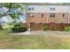 Exterior shot of the backyard with a wooden fence and a patch of green grass at 4701 Flat Shoals Road Rd # 37H, Union City, GA 30291