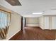 The room has a storage area with double doors, wood floors, and natural lighting at 4701 Flat Shoals Road Rd # 37H, Union City, GA 30291