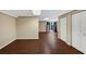The open room features neutral walls, wood floors, and access to the outside at 4701 Flat Shoals Road Rd # 37H, Union City, GA 30291