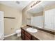 The bathroom features a large mirror, vanity with a dark cabinet, and a shower at 4701 Flat Shoals Road Rd # 37H, Union City, GA 30291