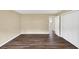 The bedroom showcases an open floor plan, neutral paint, and gorgeous wood floors at 4701 Flat Shoals Road Rd # 37H, Union City, GA 30291