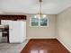 Cozy dining area featuring hardwood floors, tile floors, and a chandelier overhead at 4701 Flat Shoals Road Rd # 37H, Union City, GA 30291